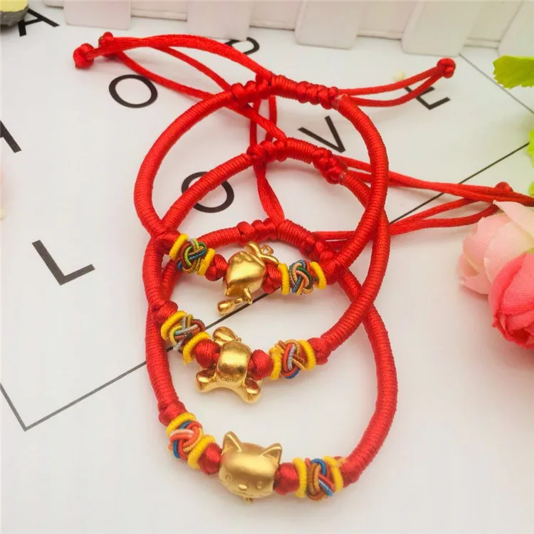 

Viet Nam Alluvial Gold Jewelry Brass Gold Plated Accessories Weaving Red Rope Bracelets Radish Cat Skull Bracelets Bracelets