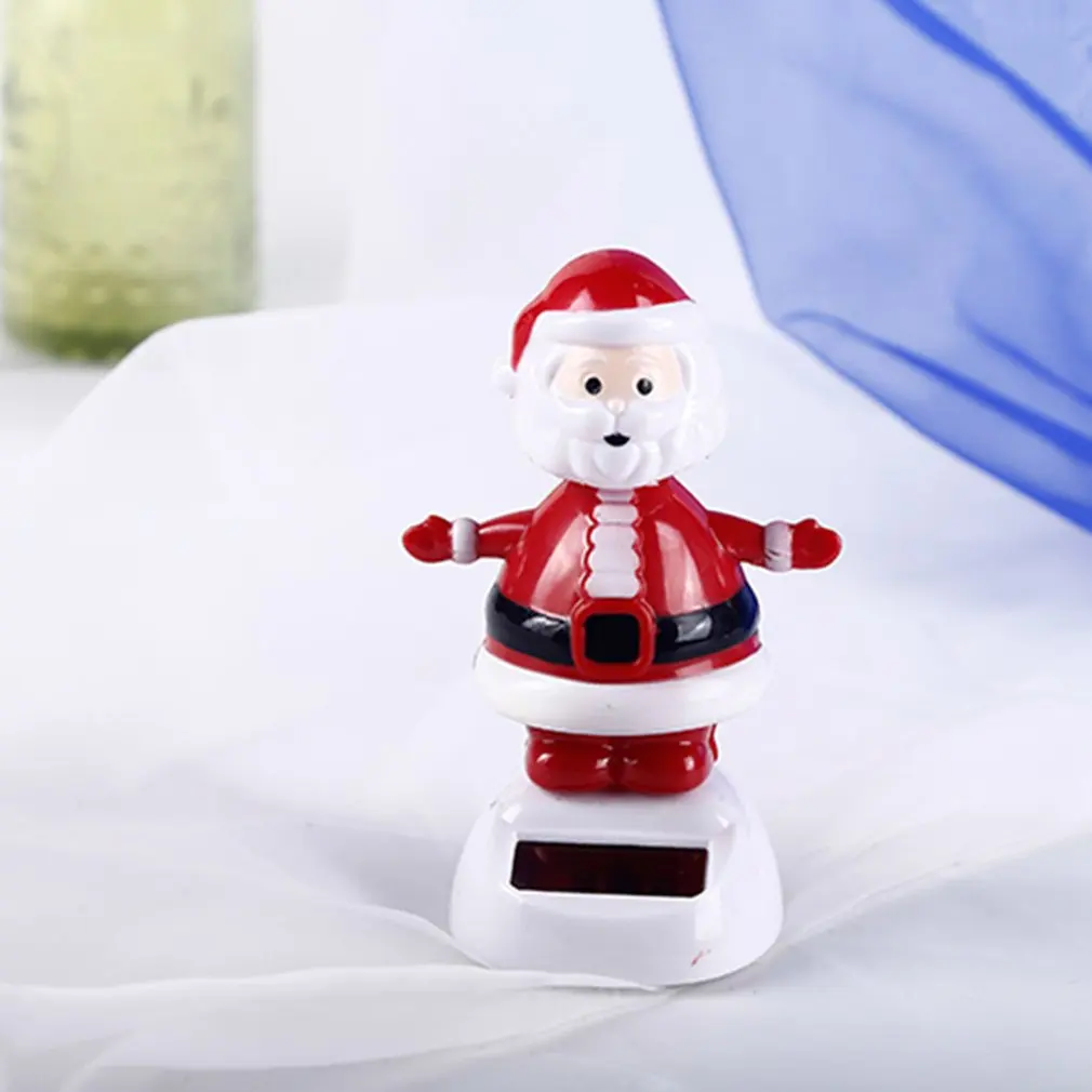Santa Claus Elk Snowman Solar Shaking Head Action Figure Anime Penguin Angel Abs Toy Christmas Gift Car Interior Decoration