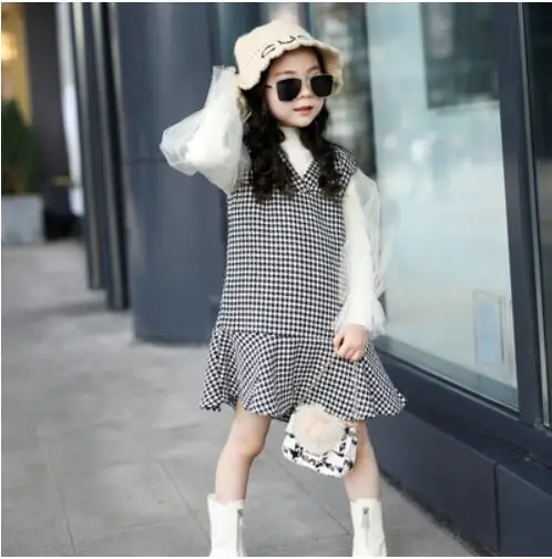 

2019 new girl temperament houndstooth knit vest fishtail skirt stitching lace sleeves knitted two-piece set