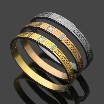 

Titanium steel jewelry wholesale G letter red green oil drop stripe grid wide face women's Bracelet