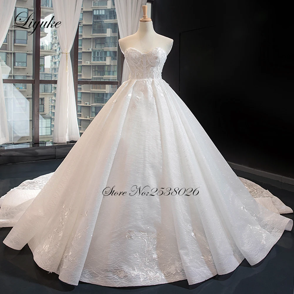 

Liyuke Gorgeous Ball Gown Wedding Dress With Chapel Train Of Delicate Skirt Bridal Dress