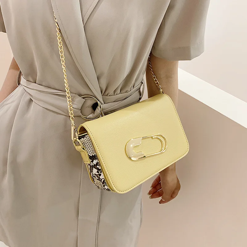 

2019 new snakeskin stereo small square bag metal paper clip shoulder diagonal women's bag