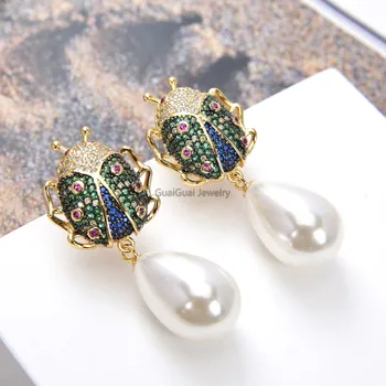 

GuaiGuai Jewelry White Sea Shell Pearl Yellow Golden Plated CZ Beetle Earrings