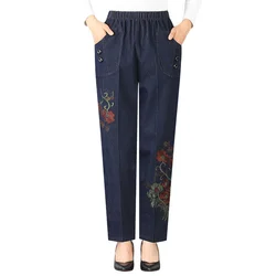 Meia idade feminina calças de brim de grandes dimensões casual cintura alta calças retas lager tamanho 4xl bolso solto bordado denim