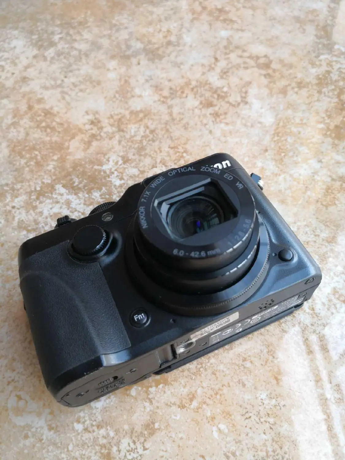 USED Nikon COOLPIX P7100 10.1 MP Digital Camera with 7.1x Optical Zoom NIKKOR ED Glass Lens and 3-Inch Vari-Angle LCD