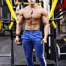 Весна новые мужские узкие спортивные штаны тренажерные залы фитнес брюки для бодибилдинга Мужские штаны для бега и тренировок повседневные Модные брюки брендовые узкие брюки