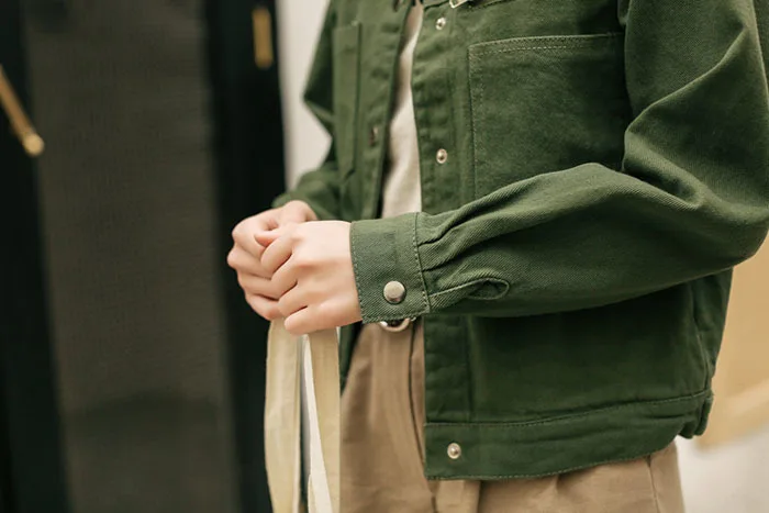 the long haul jacket in washed olive herringbone