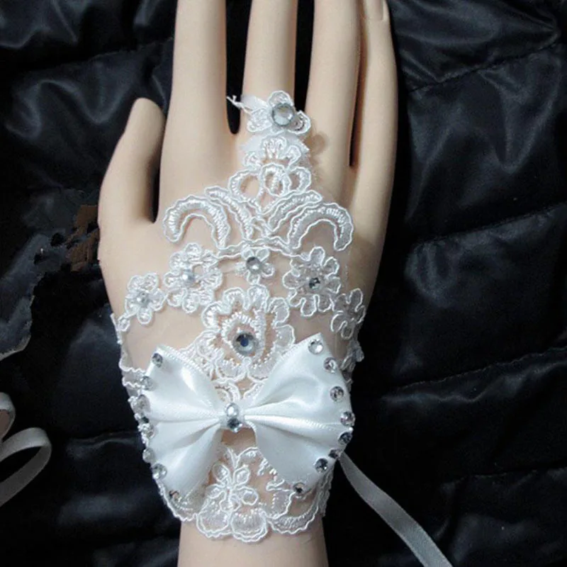 H22ec98aaf4804b678e2292912246dd83U Elegan Lace Short Bridal Gloves Inlaid Rhinestone Bowknot Slim Bridal Fingerless Gloves White Ivory Wedding Gown Accessories Mallzona