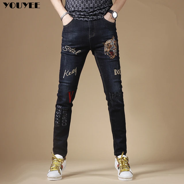Men's jeans spring new tide slim stretch elastic feet embroidered