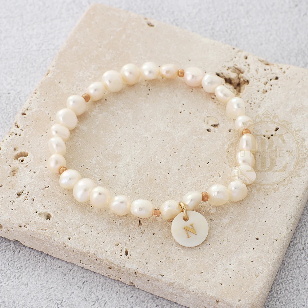 torque bangle One Fashion Jewelry Fresh Water Pearl and Shell Letter Elastic Bracelet - 58mm (BE189) plain gold bangles