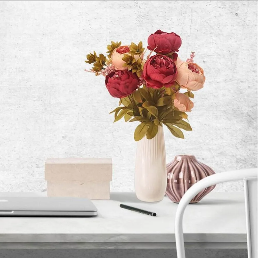 Dining room table decorated false flowers core peony peony flower shape
