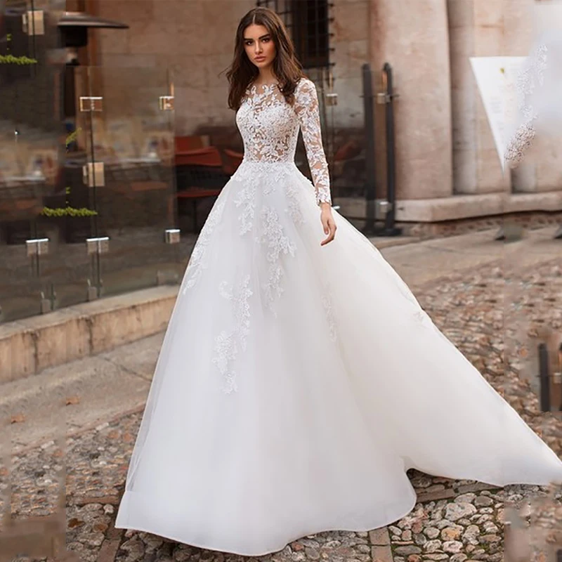 

Long Sleeves Tulle Wedding Dresses A Line Lace Appliques Wedding Gowns Back Button See-through Bridal Dress dubai 2019