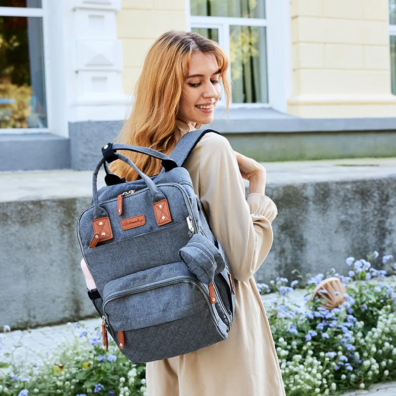 

Cross border potential new embroidered mummy bag multi functional large capacity double shoulder diaper bag