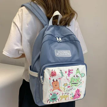 

DCIMOR New Waterproof Nylon Women Backpack Female Graffiti travel bag panelled Schoolbag for teenage girls Lovely Book Mochilas