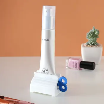 

Multifunctional Bathroom Plastic Cream Tube Squeezing Dispenser Rolling Tube Squeezer Tooth Paste Squeezer Toothpaste Dispenser