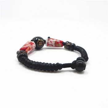

Hand woven Japanese style glazed bead three side Buddha carp flag six eye Tianzhu bracelet animal year bracelet couple bracelet