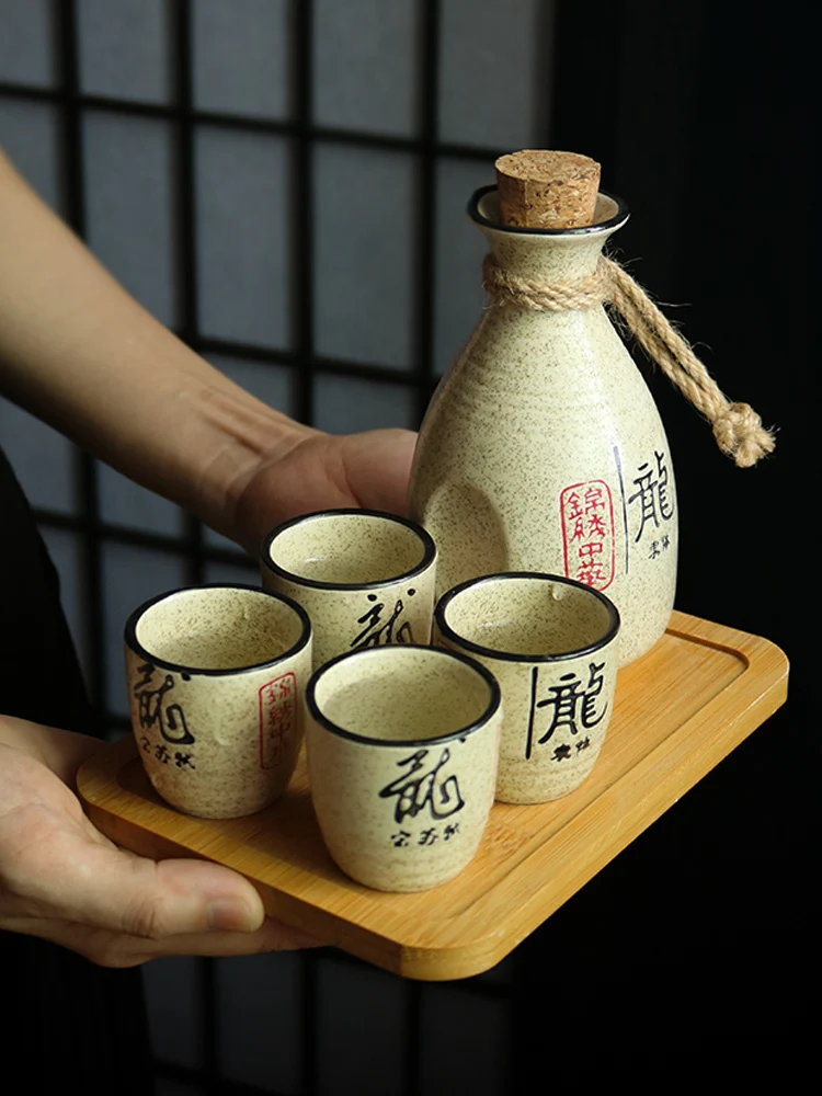 https://ae01.alicdn.com/kf/H239e4ce23c47472caf1dfbcccda1060cR/Japanese-style-vintage-sake-yellow-white-wine-spirit-separator-ceramic-wine-pot-cup-suit-traditional-sake.jpg