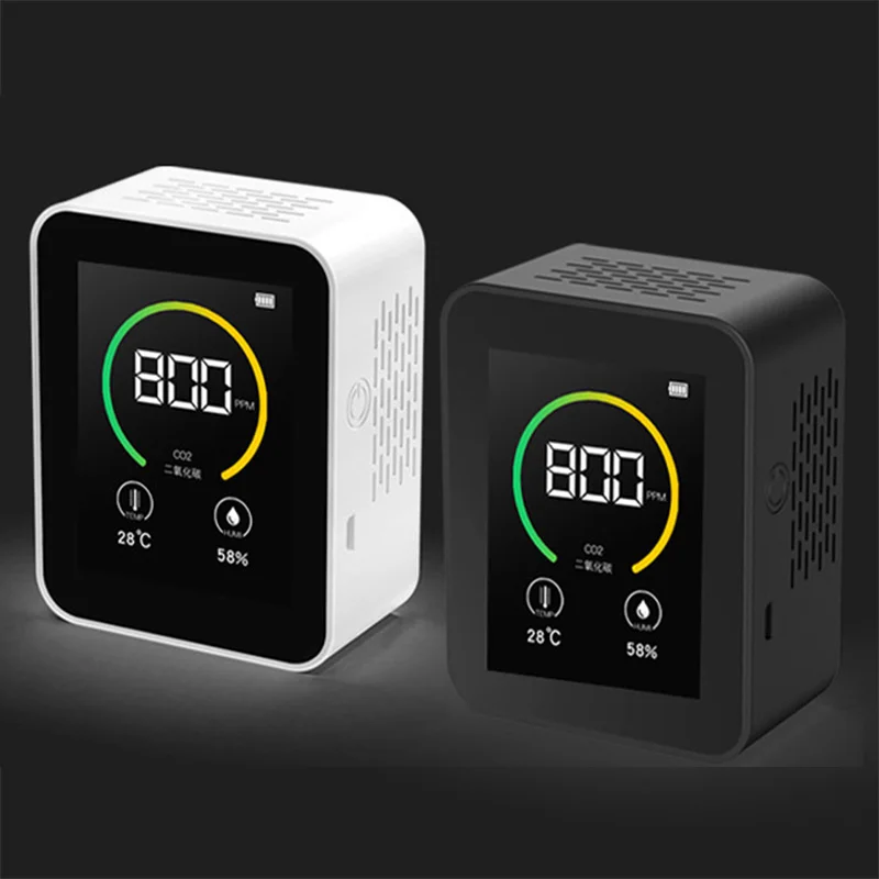 Two Carbon Dioxide Detectors with LED displays showing CO2 concentration, temperature, and humidity; one is white and the other is black. These Smart CO2 Detectors offer precise air quality control for your home or office.