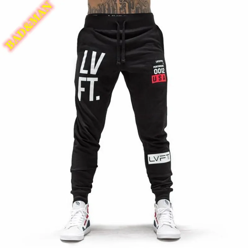

Muscle Team Leader Summer New Sports Pants Men's Loose Close Fit Long Pants Men's Small Feet Health Pants Casual Pants Joggers