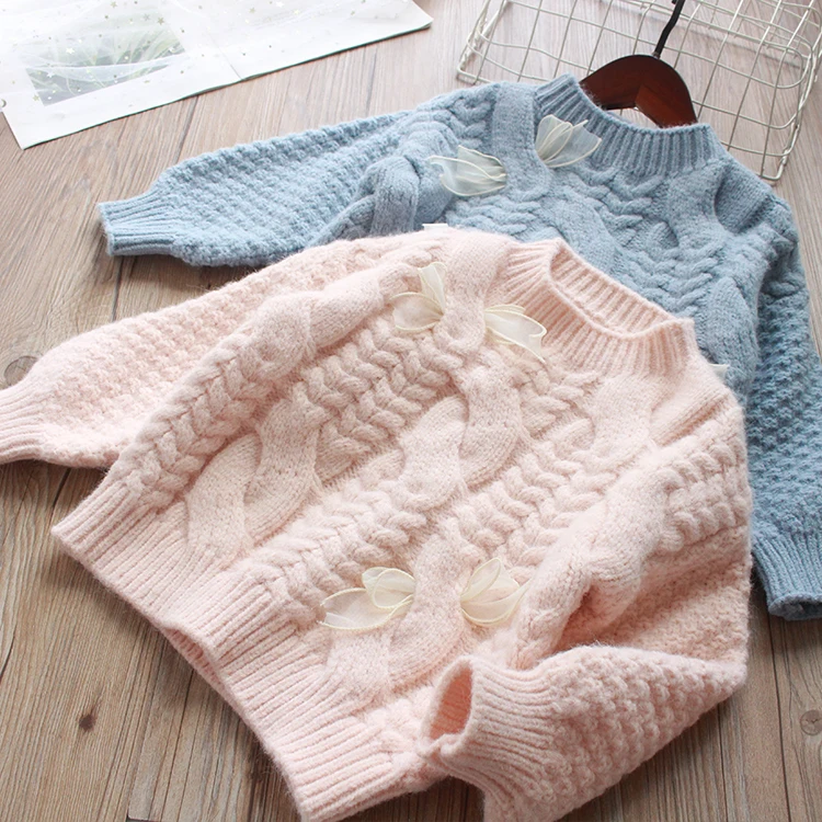 

Knitting wool into a bow sweater