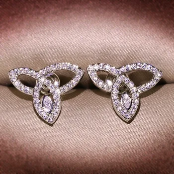 

Korean version of refined temperament simple wild zircon with white zircon bow earrings needle sweet net red earrings