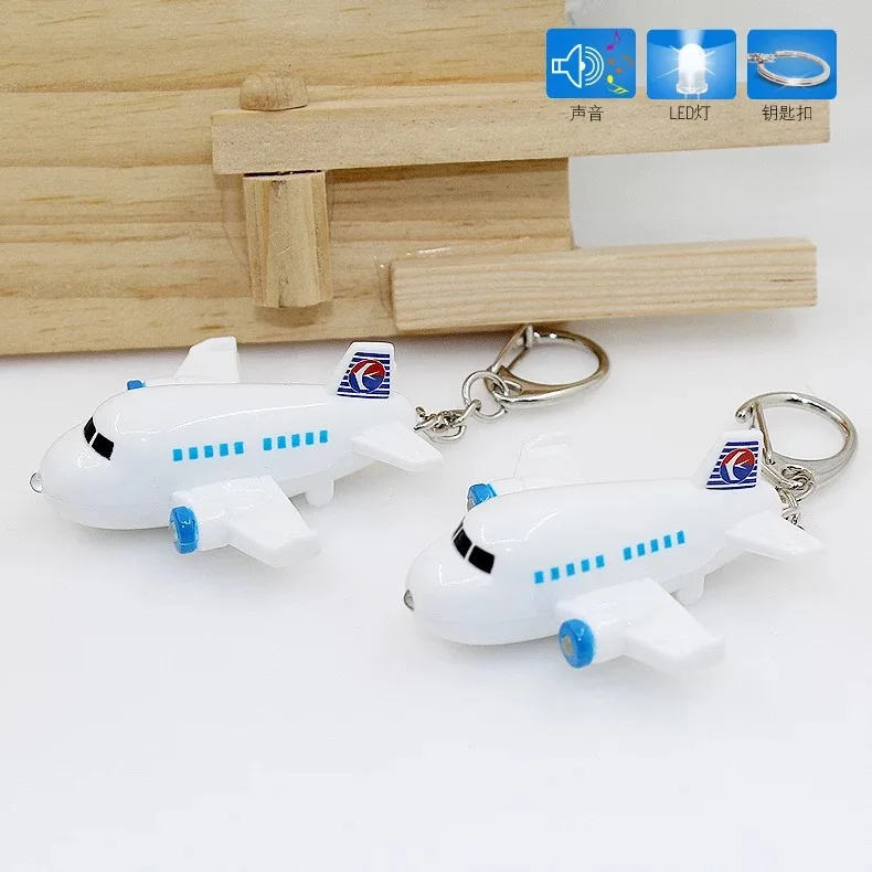 

FREE SHIPPING by FEDEX 100pcs/lot 2014 New Malaysia Airlines 3D LED Plane Flashlight Keychain With Sound Airplane Keyring