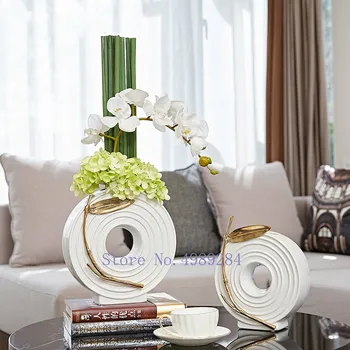 

Nordic Creative Ceramic vase Gold Hollow Round Flower arrangement Modern home Decorative ornaments Wedding decorations