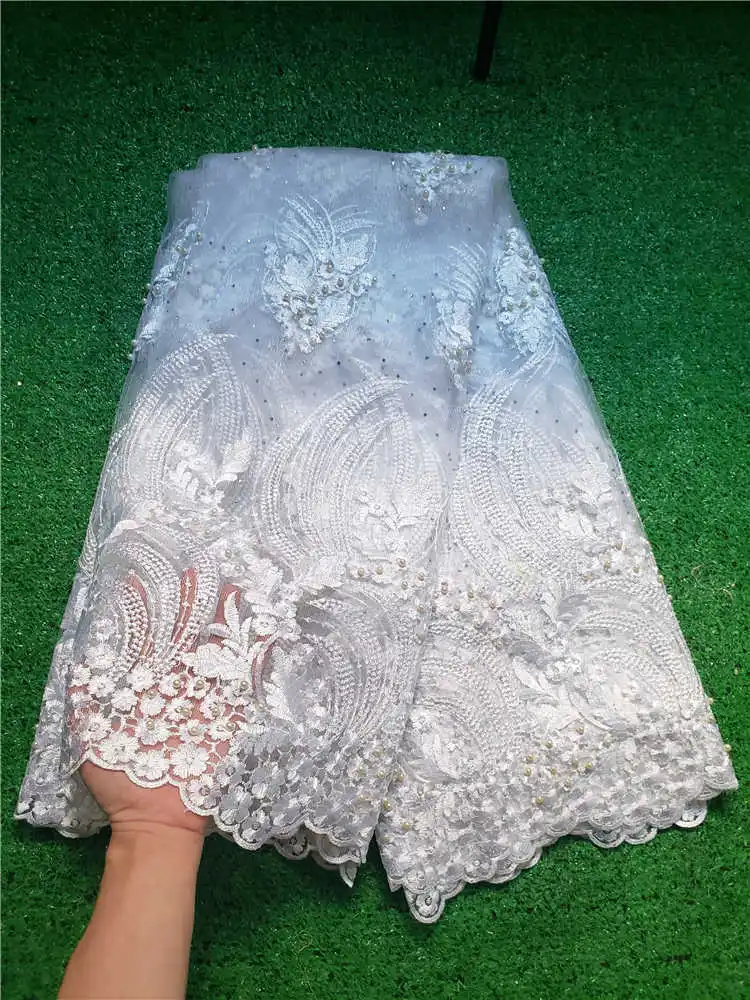 

Factory price latest African lace fabric high quality tulle lace With Beads and stones fabric for Wedding Dresses Winn138a White