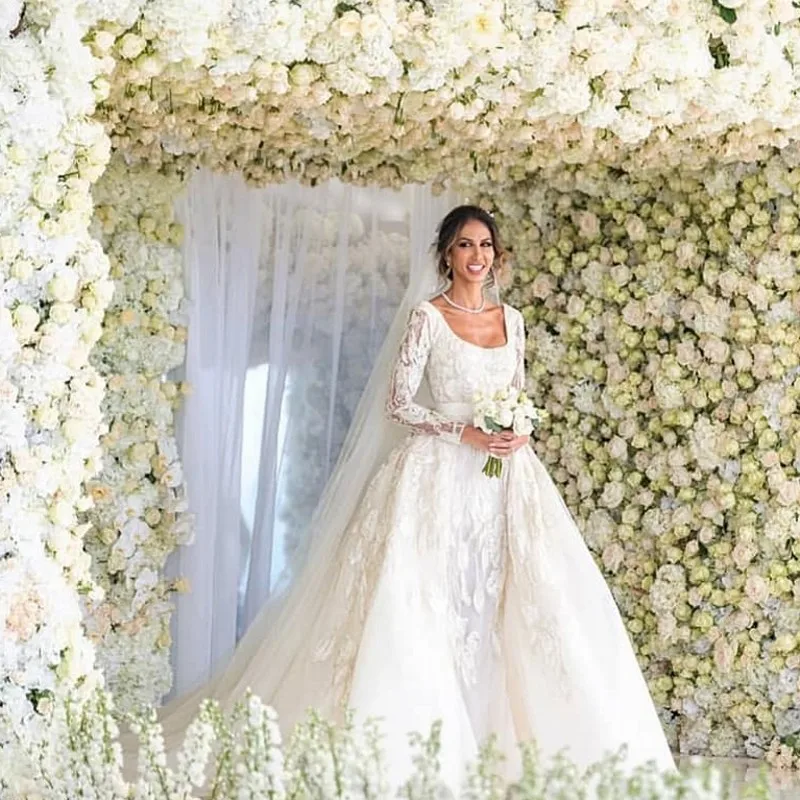 

Saudi Arabic 2010 Unique Lace Bridal Dresses With Detachable Train Modest Full Sleeves Mermaid Wedding Gowns