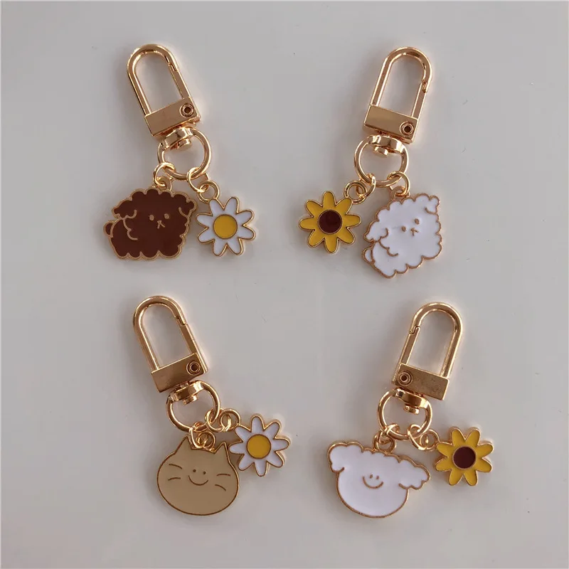 Llavero con hebilla de dibujos animados para niña, llavero de dibujos animados de estilo coreano, con diseño de gatito, cachorro, girasol, estuche para lápices, bolso con cara sonriente, colgante decorativo Kawaii