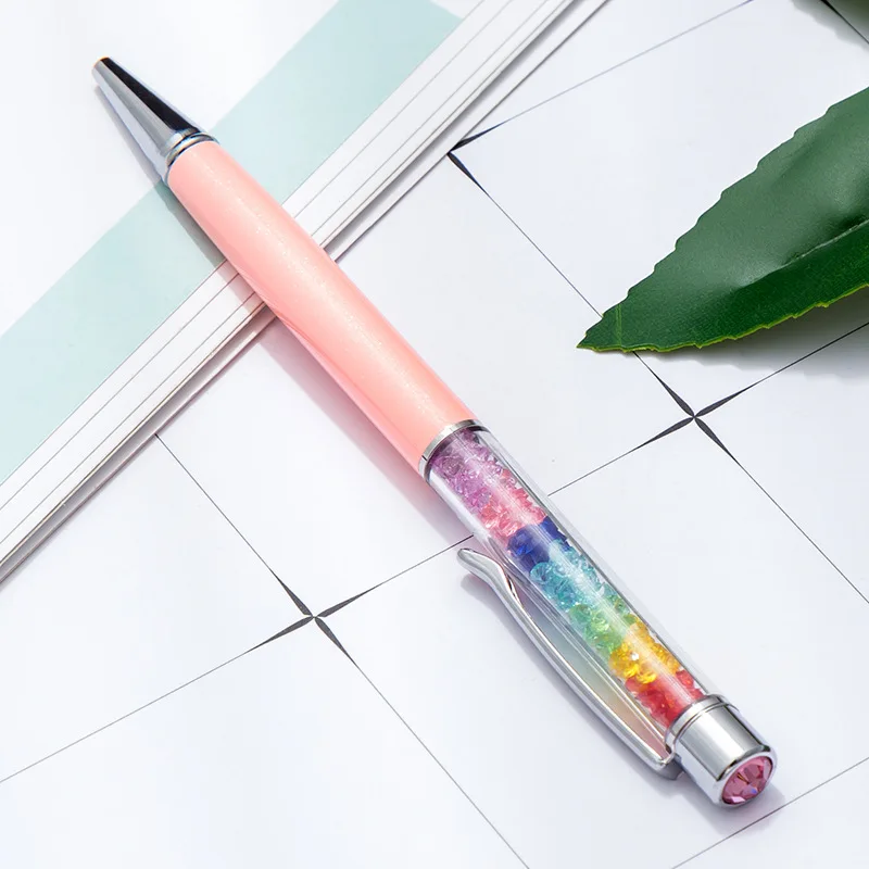 

Free laser custom colorful water crystal ball pen multicolor student stationery metal rotating advertising pen custom LOGO