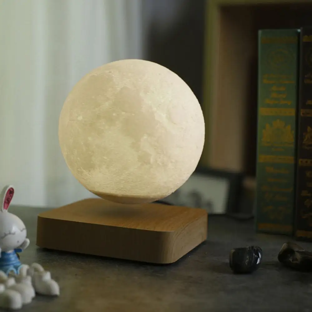 Magnetic Suspension Moon Night Light Creative 3D Floating and Spinning in Air Freely with Luxury Wooden Base Home Decoration
Magnetic Suspension Moon Night Light Creative 3D Floating and Spinning in Air Freely with Luxury Wooden Base Home Decoration