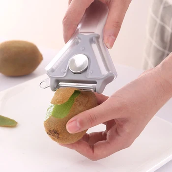 

Rotary peeler multi-function three-in-one peeler fruit peeler peeling potato artifact cut cucumber weapon (random)