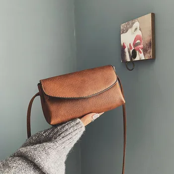 

A women's bag with a mobile phone in one shoulder messenger bag