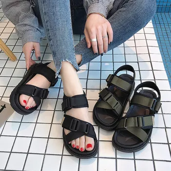 

Net red Roman sandals female fairy wind 2020 new wild thick bottom muffins ins super fire beach shoes tide