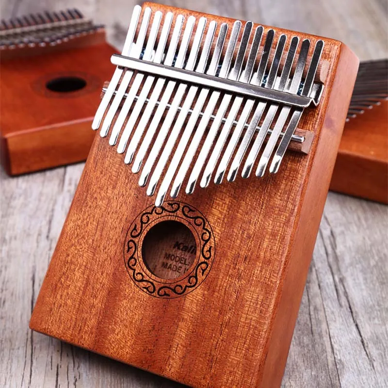 

Xuan Crane Instrument Kalimba Thumb Piano Mahogany Veneer 17 Sound Finger Piano Beginners Portable Instrument