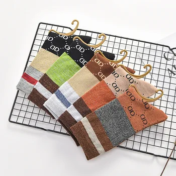 

Five pairs of men and women general new spring and summer fashion breathable multicolor letters cotton socks