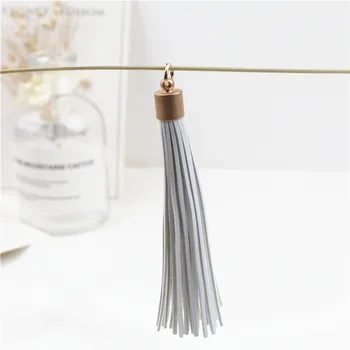 

Metal copper cap leather long tassel handmade material