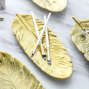 

Gold Feather Shape Ceramic Jewelry Plate Dish Porcelain Candy Trinket Food Fruit Serving Tray Ring Storage Plate Home Decorative