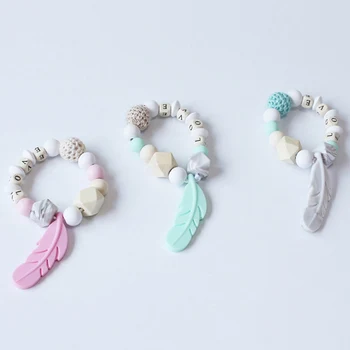 

Baby Training Teethers Bracelet Feather Pendant Chewing Teething Toy Gifts Beads Pacifier Clips