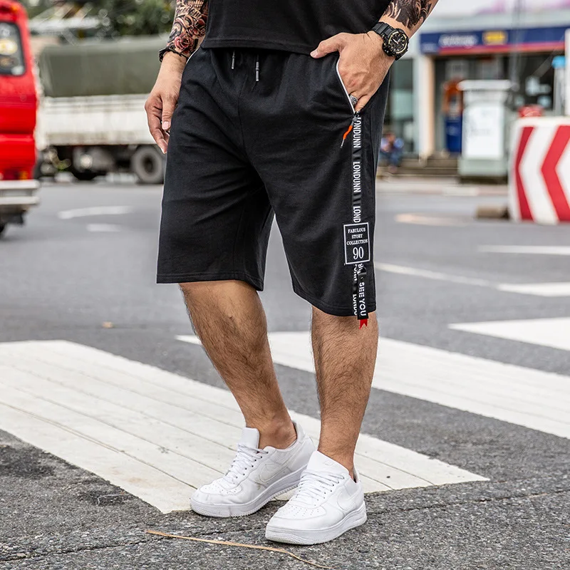 

Summer casual pants men's shorts tide brand cotton sports large size beach loose Korean version