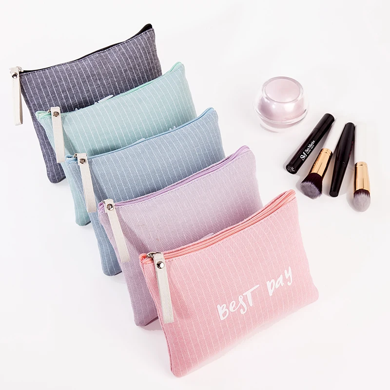 

Women Printing Canvas Letters Cosmetic Bags Custom Travel Portable Make Up Toilet Pouch