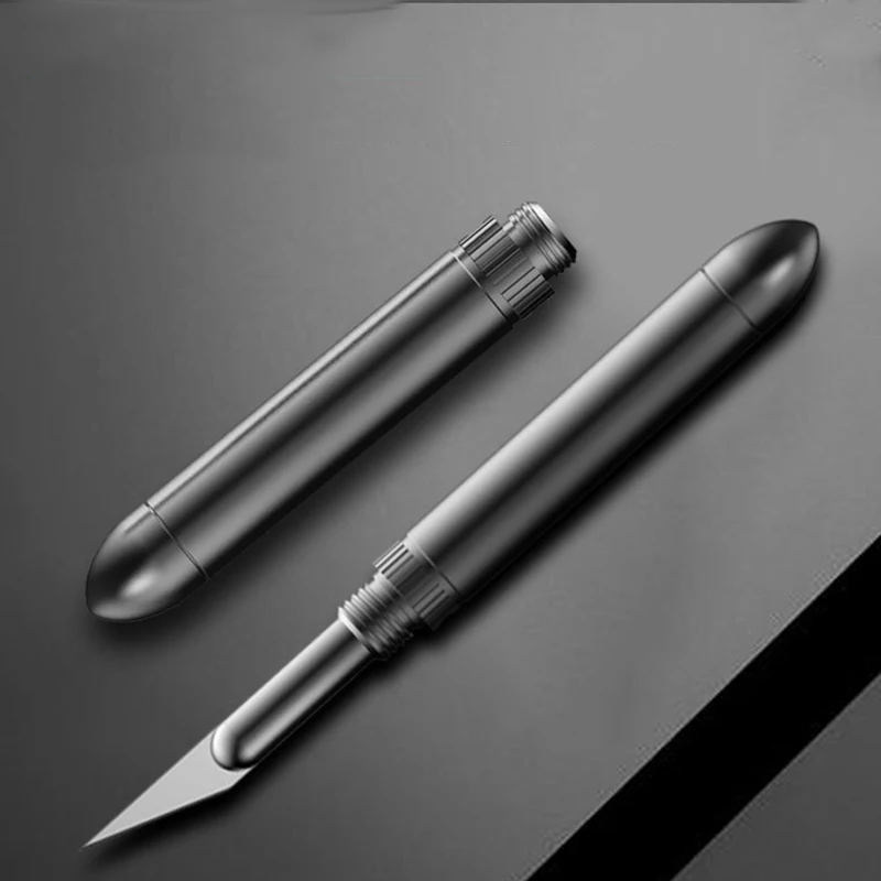 

1Pcs Small Retractable Cutter Outdoor Mini Portable Utility Knife Paper Cutter High Hardness Carbon Steel Key Chain Tool