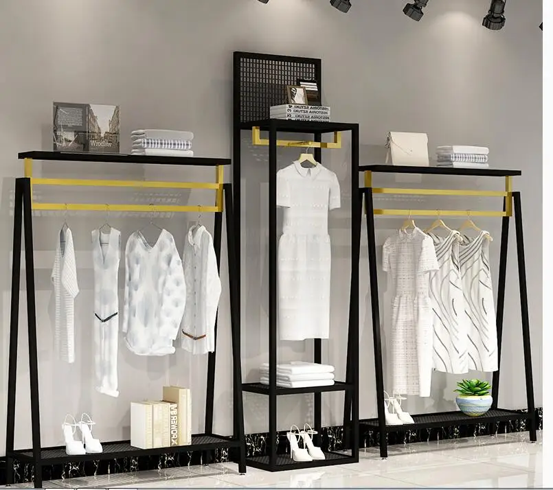 https://ae01.alicdn.com/kf/H2643694f929a4e789ece2006e72bfcfdA/Clothing-store-display-shelf-floor-type-shelf-men-s-and-women-s-clothing-store-display-shelf.jpg