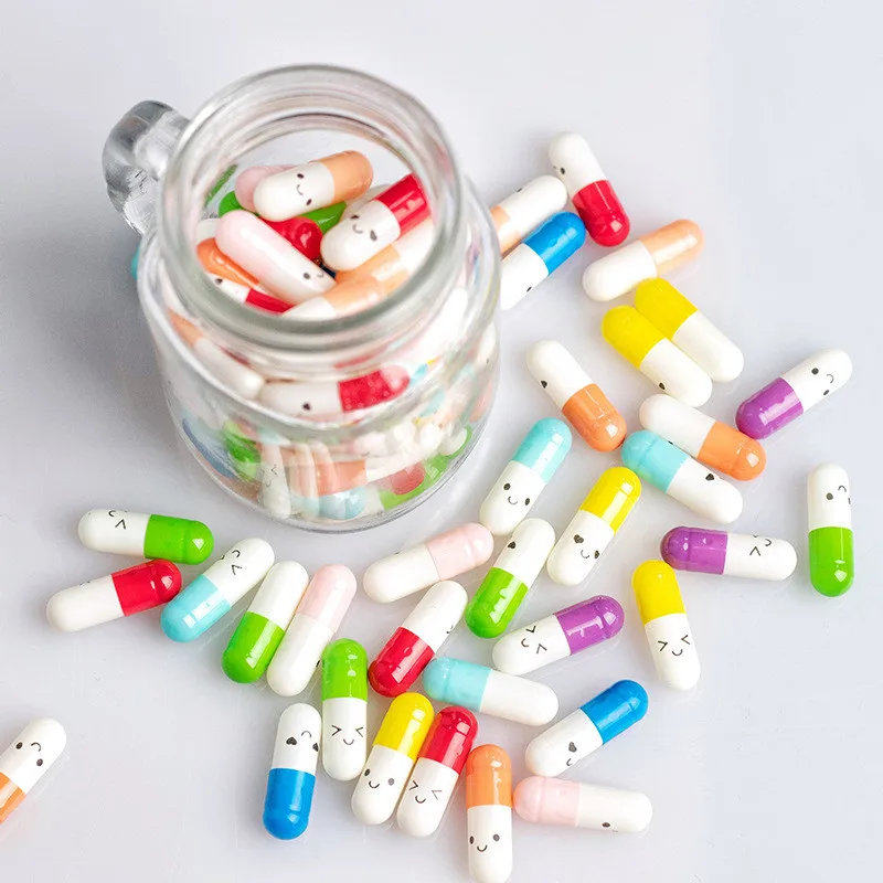 50 Uds Mini Smiley pastillas con rollo de papel Mensaje de notas en un del deseo A la deriva de la botella de la escuela suministros envoltura de cápsula carta para Navidad