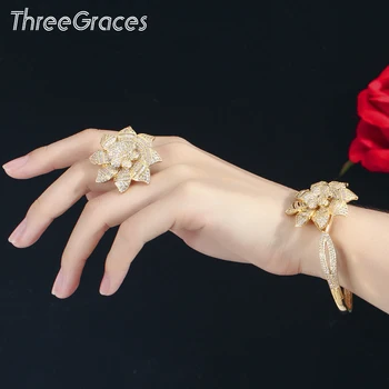 

Threegraces Dazzling Geometric Flower Gold Color Finger Ring Cubic Zircon Stone Luxury Engagement Wedding Rings for Women RG081