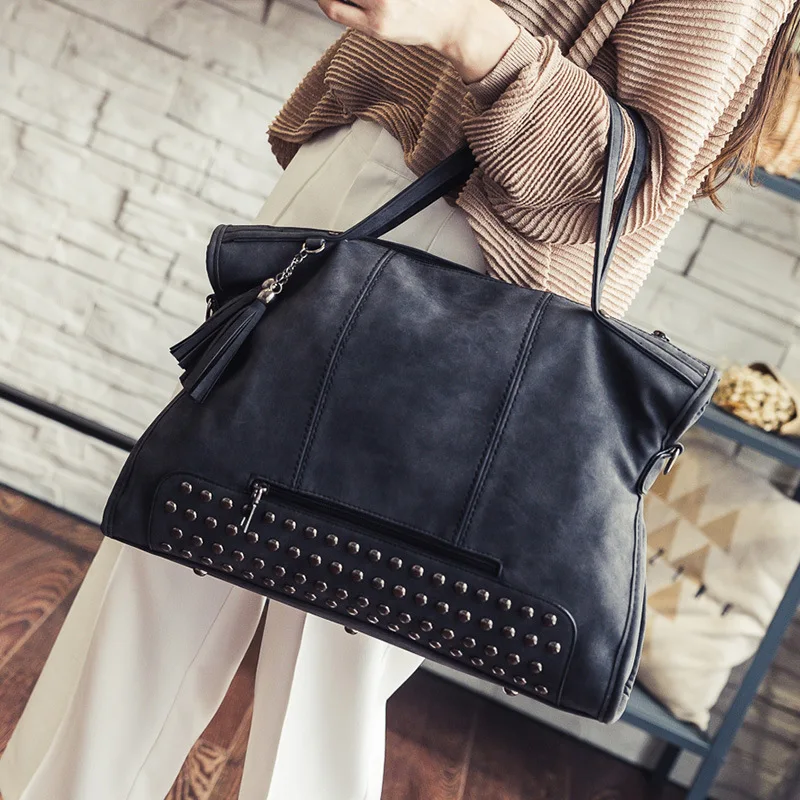 

WOMEN'S Bag 2017 New Style Rivet Tassel Bag Europe And America Fan Bike Packet Women's Dull Polish Hand Shoulder Big Bag