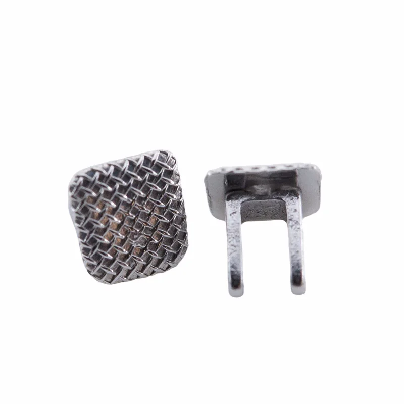 Dentst 50pcs Fogászati orthodontic Nyelv Szeliditő lingual spikes bondable Sarokpánt Nyelv Ruha falatot turbos Illedelmesség gomb Karéj