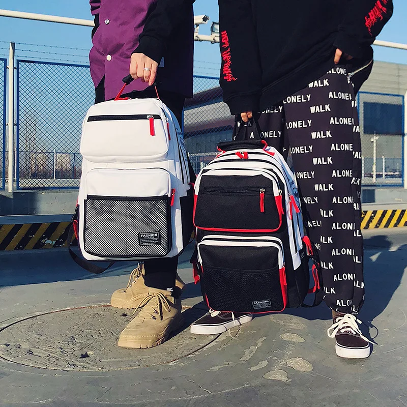 

Contrast backpack junior high school students' backpacks large capacity travel computer backpacks