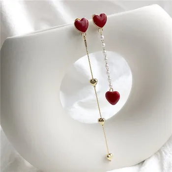 

South Korea's temperament joker asymmetric stud earrings her long red love red tassel pearl earrings